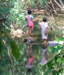 Helping parents by fishing - Karen village in Thailand