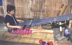 A Lisu lady weaving cloth