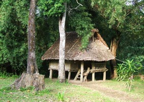 Hilltribe village hut stay on river bank