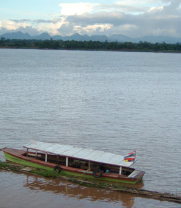Mekong river - other side is Thakhet of Laos and limestone mountains