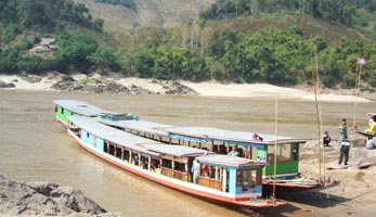Tour boat on the Mekong river - Laos